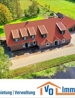 Erstbezug: Extravagante Dachgeschosswohnung mit Einbauküche und Loggia in Kanallage von Spetzerfehn - Großefehn