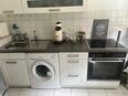 Küche mit elektronischen Geräten in 75172