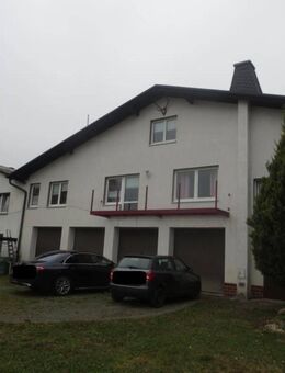 Objekt-Nr.: 15024 - PAKET - zwei attraktive Einfamilienhäuser mit Balkon und 4 Garagen auf großem Grundstück in Falkenstein - Falkenstein (Vogtland)