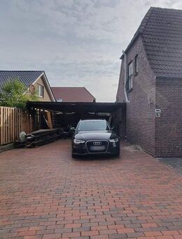 Stilvolle Doppelhaushälfte mit ca. 130 m² Wohn- und Nutzfläche, Carport, Garten und neuer Heizung - Bockhorn (Niedersachsen)