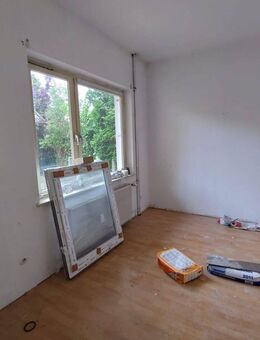 Attraktive Kapitalanlage mit Ausbaupotenzial – Haushälfte mit drei Wohnungen und zusätzlichem Apartment-Möglichkeit - Duingen
