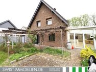 Freiheit spüren: Besondere Erdgeschosswohnung mit Garten, Wintergarten, Keller, Speicher und Garage - Weilerswist