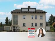 IMMOPARTNER - 3-Zimmer-Dachgeschosswohnung mit Balkon und Garage - Nürnberg