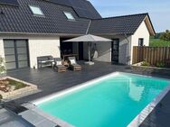 Traumhaftes Einfamilienhaus: Luxus trifft Nachhaltigkeit mit beheizbarem Pool in Sörhausen - Syke