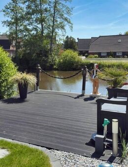 Direkt am Wasser! Stilvolle Wohnung mit hochwertigem Keller - Dornum