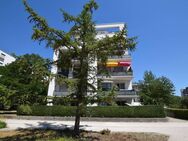 AIGNER - Moderne 2-Zimmer-Terrassenwohnung mit Gartenanteil in Neuhausen - München