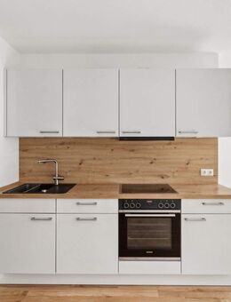 Dachgeschosswohnung mit EBK im schönen Neubauensemble - Berlin