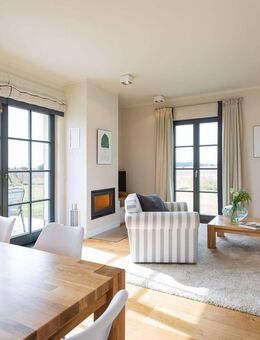 Reetdachvilla auf Rügen - Ferienhaus direkt an der Feldkante mit Weitblick, Sauna & Kamin - Dranske