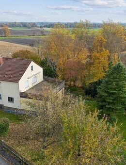 Wohnglück! Großes Zweifamilienhaus mit traumhaftem Gartenparadies inklusive Baugrundstück - Laupheim