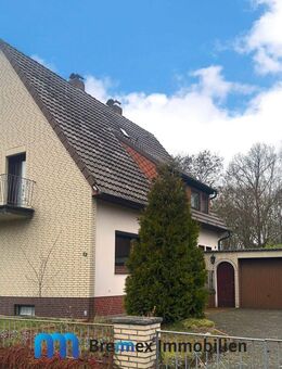 1-2-Familienhaus mit großem Grundstück und Doppelgarage - Achim