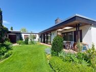 Charmanter Bungalow auf parkähnlichem Grundstück mit Anbaumöglichkeit - Kleinostheim