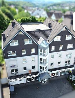 SCHADE IMMOBILIEN - Toller Weitblick - schöne 2-Zimmerwohnung mit Balkon und Tiefgaragenplatz! - Lüdenscheid