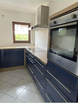 Perfekte Einsteigerimmobilie mit Einbauküche und Garage in Bad Liebenzell-Unterhaugstett - Bad Liebenzell