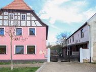Mehrfamilienhaus mit Ausbaumöglichkeit auf 3 WE und Nebengebäude zentral in Kolitzheim - Kolitzheim