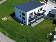 Erdgeschosswohnung mit überdachter Terrasse und Naturblick * ERSTBEZUG * - Kreßberg