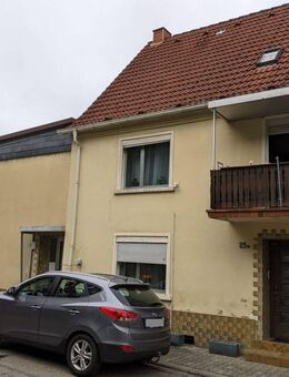 Zweifamilienhaus mit Grundstück (vermietet) - Rammelsbach