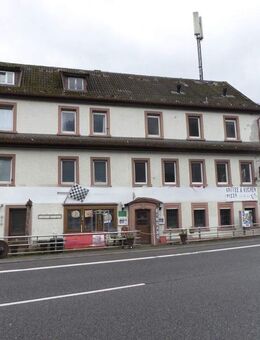 Gut vermietbares Wohn- und Geschäftshaus mit großzügigem Ausbaupotenzial direkt an S-Bahn und Fähre! - Neckarsteinach