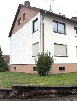 Vermietetes Zweifamilienhaus mit Garten und Garage in 66787 Wadgassen/Differten zu verkaufen - Wadgassen