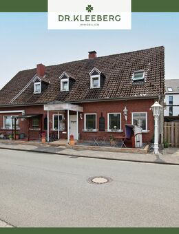 Vielseitiges Wohn- und Geschäftshaus mit Baugrundstück in zentraler Lage von Laer - Laer