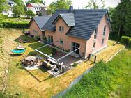 Hochwertiges Einfamilienhaus in massiver Bauweise mit großem Grundstück und durchdachtem Wohnkonzept - Plascheid