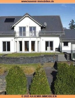 Exklusives Einfamilienhaus mit Doppelgarage und Wintergarten in Riegenroth - Riegenroth