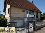Freistehendes Wohnhaus mit Garagen, Nebengelass und gepflegten Grundstück in gefragter Lage - Sondershausen