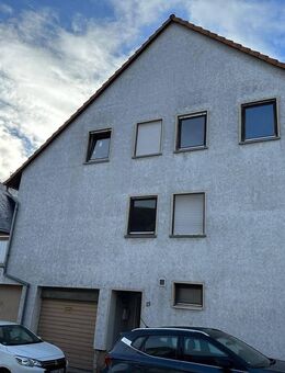 Frei werdendes Einfamilienhaus mit vielseitigen Nutzungsmöglichkeiten in Hallgarten - Oestrich-Winkel
