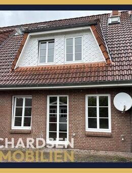 Geräumiges Reihenmittelhaus mit Süd-Terrasse und Carport-Stellplatz in Leck - Leck