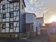 Zwei gepflegte Häuser auf einem Grundstück - Weinbach