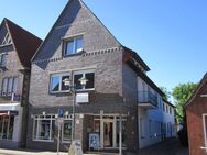Mehrfamilienhaus mit Gewerbeeinheit und Baugrundstück in Wildeshausen - Wildeshausen