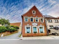 Zeitlose Eleganz trifft auf solide Rendite: Historisches Mehrfamilienhaus in Kitzingen - Kitzingen