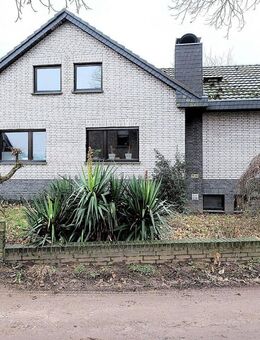 Vollunterkellerter Satteldachbungalow mit Garage - Goch
