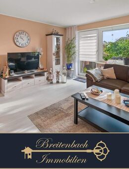 Gepflegte 4-Zimmer-Wohnung mit Balkon und ausgebautem Dachboden - Butjadingen