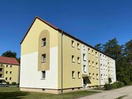 Attraktive 3-Zimmer-Wohnung mit Balkon und dem Blick ins Grüne! Optional mit Garten - Rauen