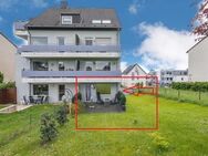 Leverkusen-Steinbüchel: Attraktive Erdgeschosswohnung mit Sonnen-Balkon, Terrasse und Gartennutzung - Leverkusen