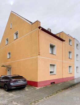 Doppelhaushälfte mit drei Wohneinheiten und Garten in Duisburg - Duisburg