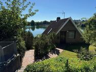 (Reserviert) Einfamilienhaus mit ELW am Trentsee mit Schlossblick und Steg, provisionsfrei - Plön