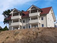 NEUBAU! Sonnige 3-Zimmer-Erdgeschosswohnung mit super Aussicht und schöner Terrasse + Garage - Bogen