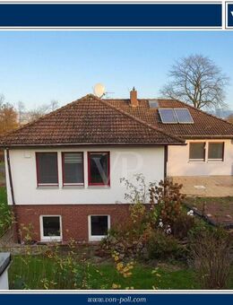 Einfamilienhaus mit Einliegerwohnung in frisch teilrenoviertem Zustand - Hessisch Oldendorf