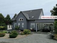 IMMOBERLIN.DE - Attraktives Einfamilienhaus mit Gartenidylle in familienfreundlicher Lage - Jüterbog
