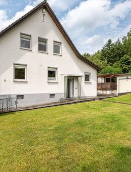 MANNELLA *Waldnähe trifft Stadtnähe - Familienfreundliches Zuhause mit Anbaupotenzial & großem Grundstück* - Lohmar