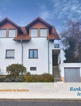 Familienfreundliches Einfamilienhaus mit zwei Garagen in Höchen - Bexbach