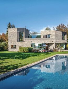 Konsequent beeindruckend. Prämierte Villa auf traumhaften Eckgrundstück. - Gräfelfing