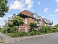 Zwei Ebenen, klare Linien - Maisonettewohnung mit Balkon und Tiefgarage in gepflegter Wohnanlage - Meerbusch