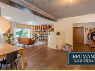 BRUMANI | Nachhaltiges und energieeffizientes Mehrfamilienhaus mit Laden in Sulzburg - Sulzburg