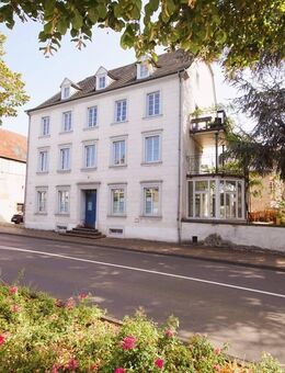 Mehrfamilienhaus mit 5 Wohnungen/1 Gewerbeeinheit und großem Garten im Zentrum der Stadt Wittlich - Wittlich