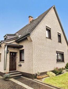 Schwanewede: Solides und gepflegtes Einfamilienhaus mit Garage in beliebter und zentraler Wohnlage - Schwanewede