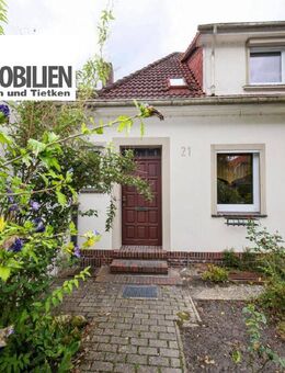 TT bietet an: Doppelhaushälfte mit großem Garten - Ihr Rückzugsort in Mariensiel! - Sande