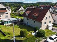 Liebevoll gestaltetes Zweifamilienhaus mit Einliegerwohnung und zwei Baugrundstücken in Niestetal - Niestetal