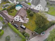 Renovierungsbedürftiges Einfamilienhaus in sonniger Lage mit Nebengebäude - Geretsried